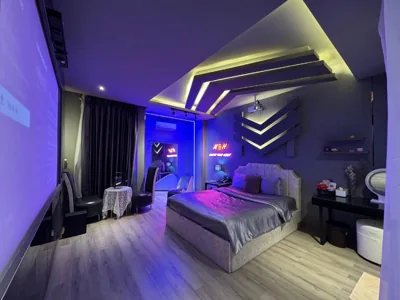 Suite avec balcon — M&H Cinema